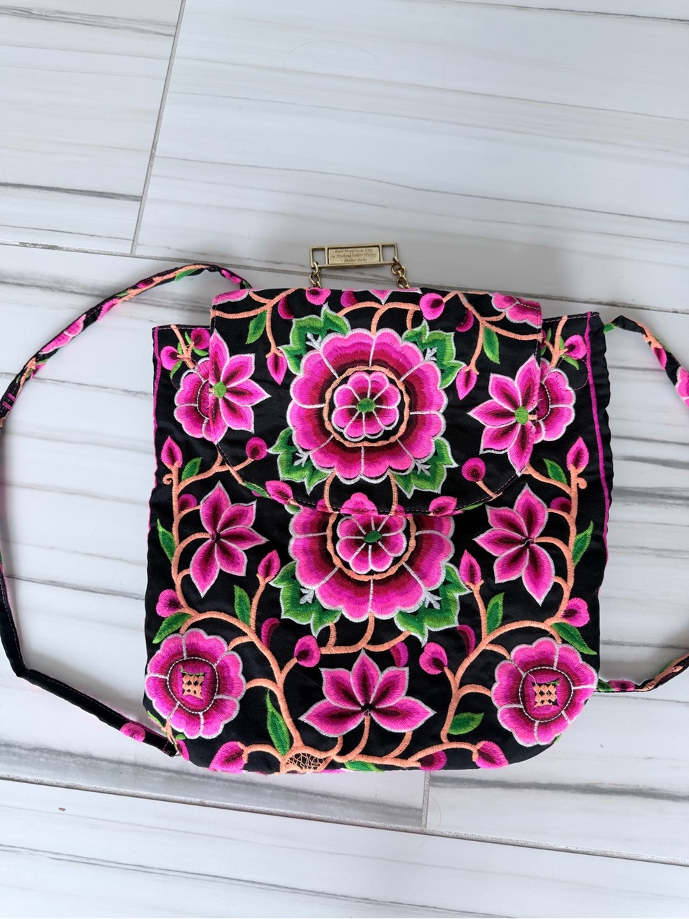 Black Floral Embroidered Crossbody Backpack with Pink and Green Accents